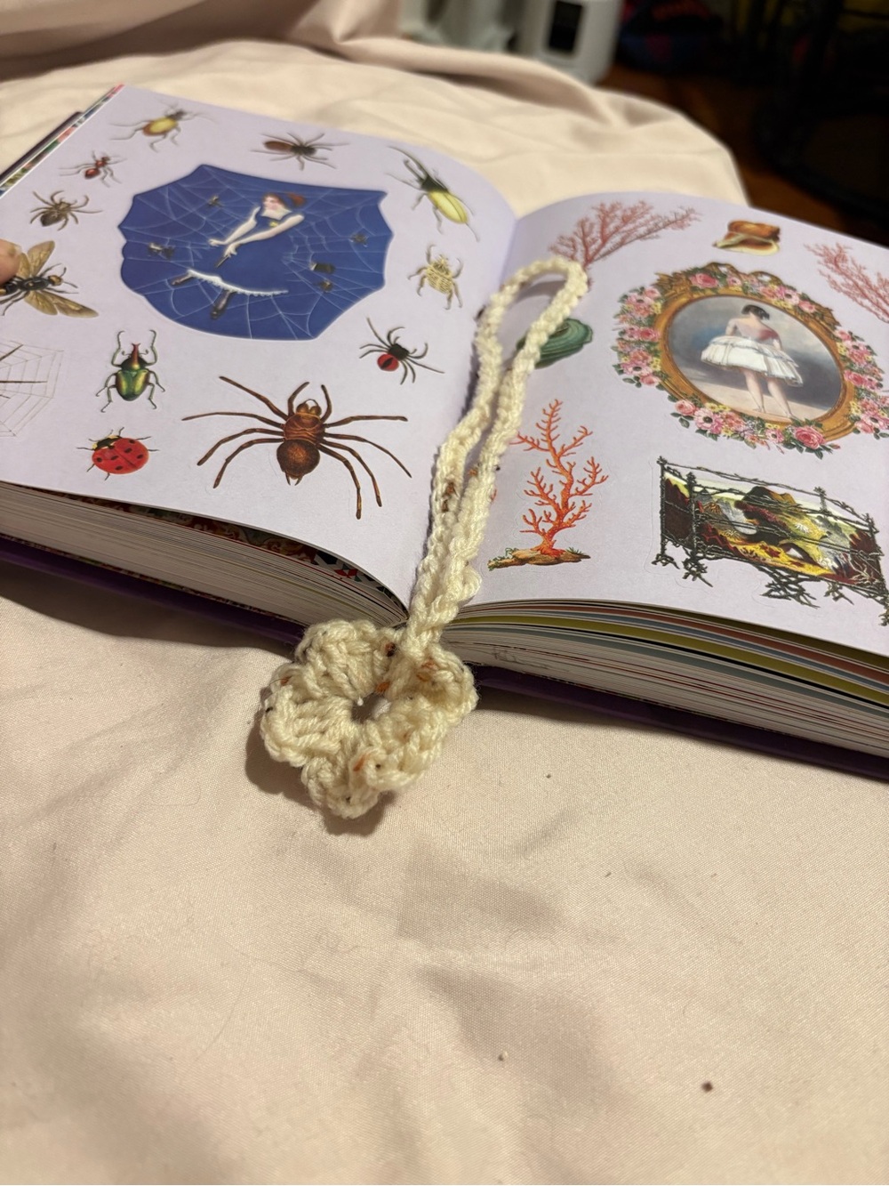 Cream with speckles crochet bookmark/keychain/bag charm with a touch of whimsy